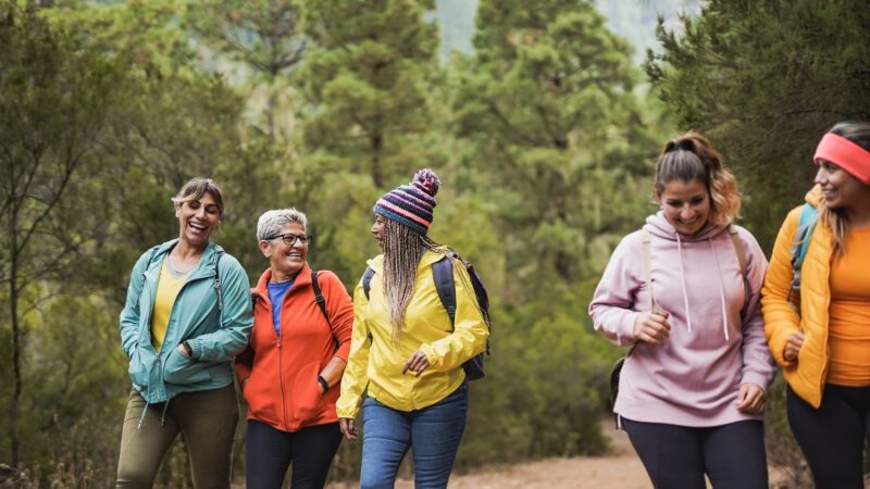 women having fun during a sunny walk outdoors