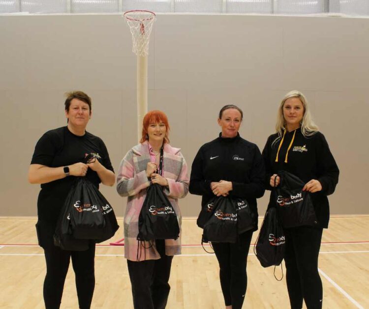 L-R, Helena Banfield - Chair at Wilmslow Lightning Netball Club, Hannah Whitley Everybody Grants & Funding Lead, Nichola Foulkes England Netball Development Officer Cheshire, Paige Kindred - Head Coach at Wilmslow Lightning Netball Club