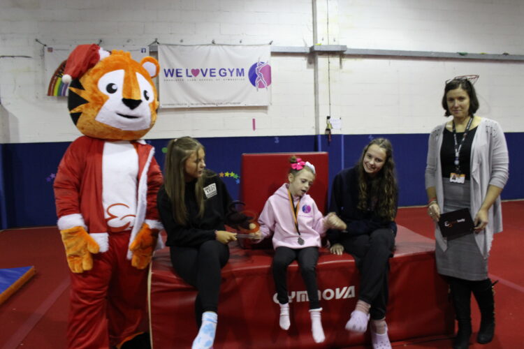 L-R: Todd the Tiger Everybody mascot, Rosie, Sports Personality of the Year Winner Age 9-11 years – Amelia Carroll, Lily, Katie Harrop Head of People & Organisational Development at Everybody